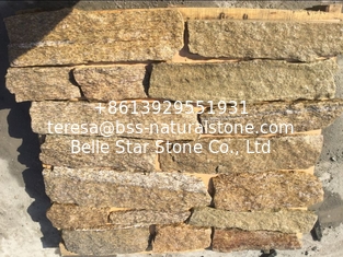 China Tiger Skin Yellow Granite Field Stone Random Granite Stone Veneer Natural Stone Cladding supplier